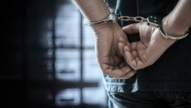 Arrested man in handcuffs