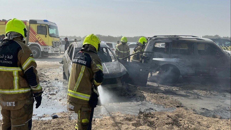 Two vehicles parked in the parking lot caught fire and were damaged