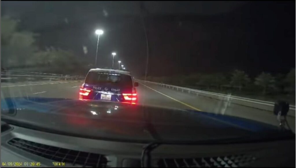 A malfunction in the car's cruise control; Abu Dhabi police rescued the driver