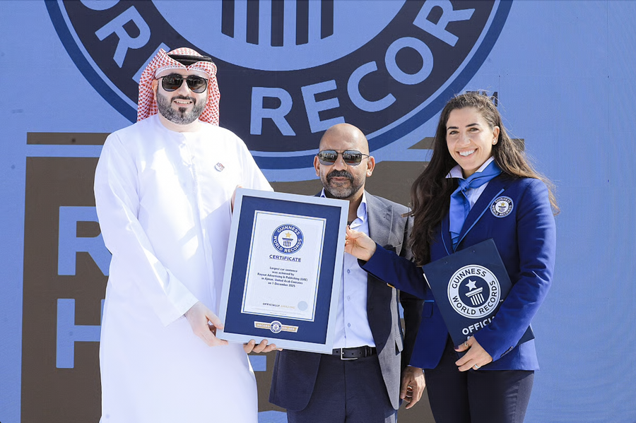 Ajman sets Guinness World Record. They parked 603 cars to form "EID AL ETIHAD UAE 54." What an amazing sight!